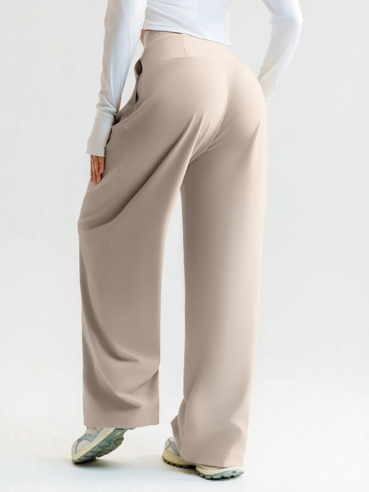 A model wearing a BRXL® High Waisted Straight Leg Commuter Pants With Pockets