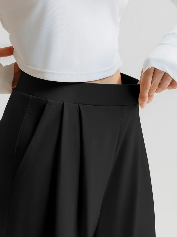 A model wearing a BRXL® High Waisted Straight Leg Commuter Pants With Pockets