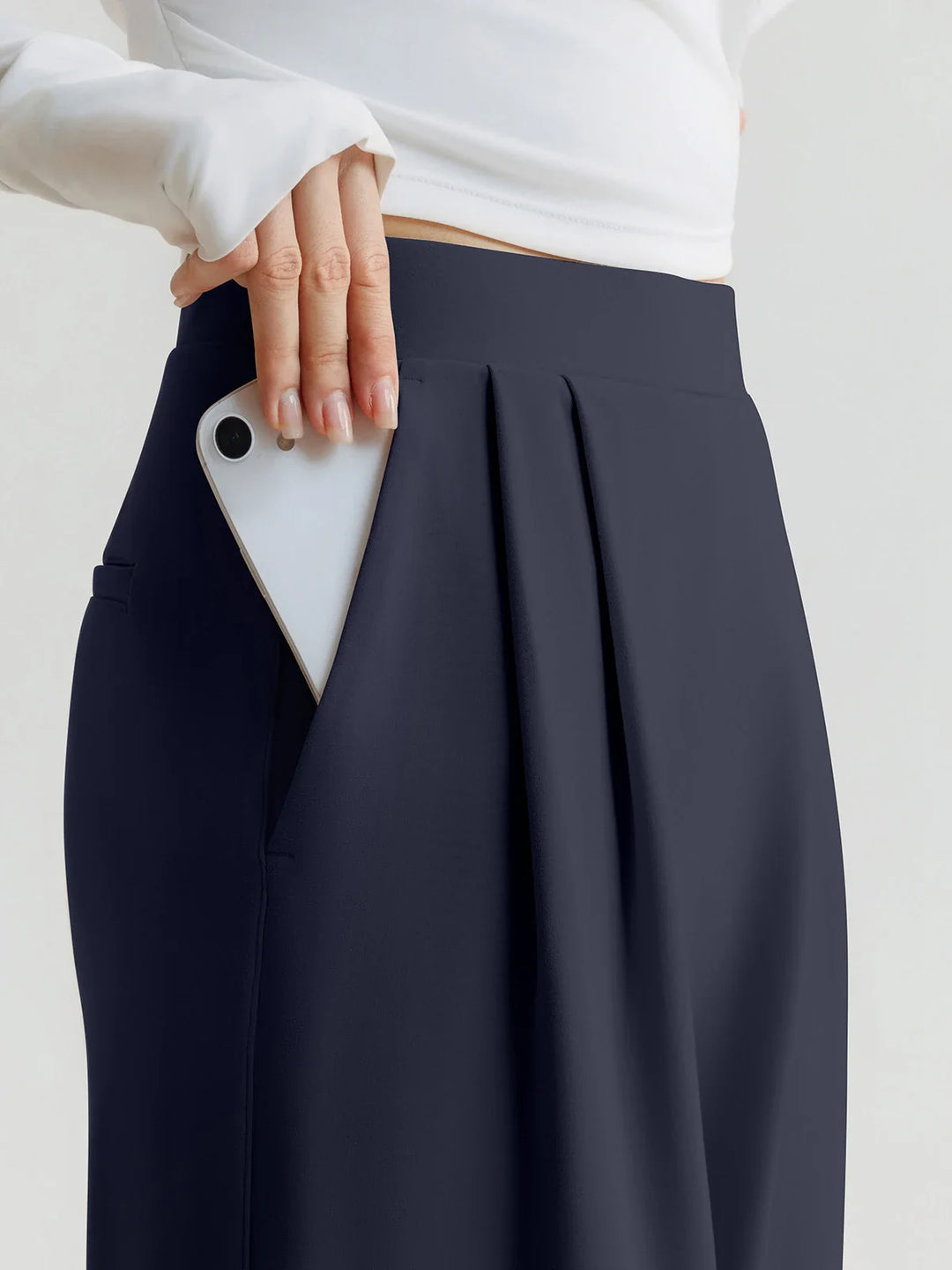 A model wearing a BRXL® High Waisted Straight Leg Commuter Pants With Pockets