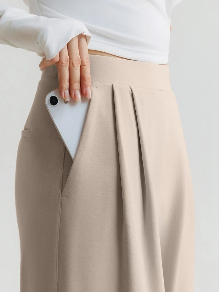 A model wearing a BRXL® High Waisted Straight Leg Commuter Pants With Pockets