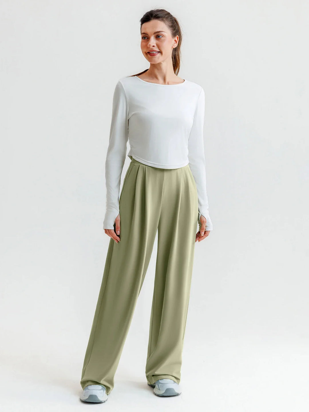 A model wearing a BRXL® High Waisted Straight Leg Commuter Pants With Pockets