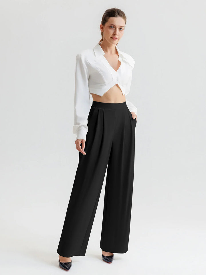 A model wearing a BRXL® High Waisted Straight Leg Commuter Pants With Pockets
