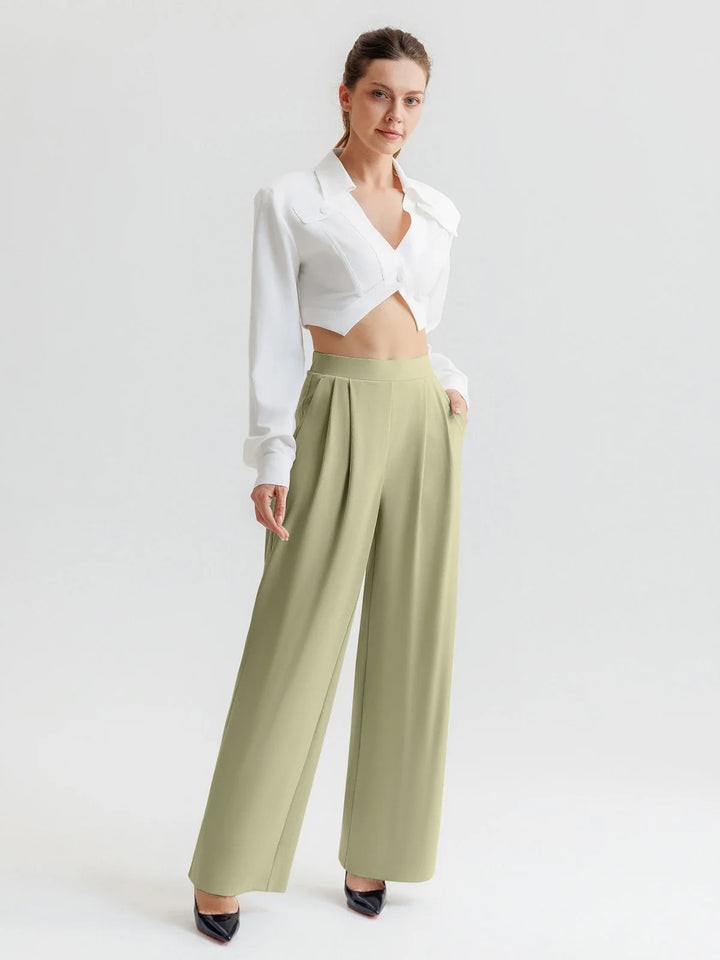 A model wearing a BRXL® High Waisted Straight Leg Commuter Pants With Pockets