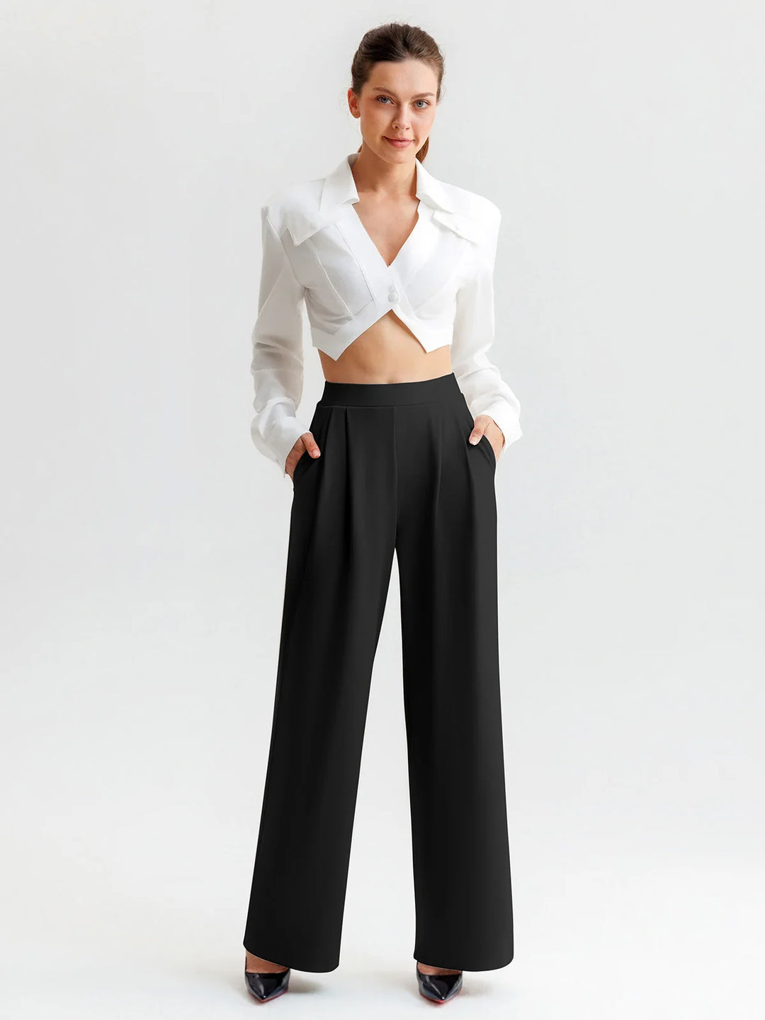 A model wearing a BRXL® High Waisted Straight Leg Commuter Pants With Pockets