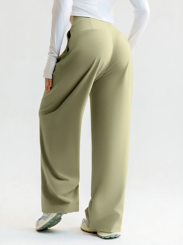 A model wearing a BRXL® High Waisted Straight Leg Commuter Pants With Pockets