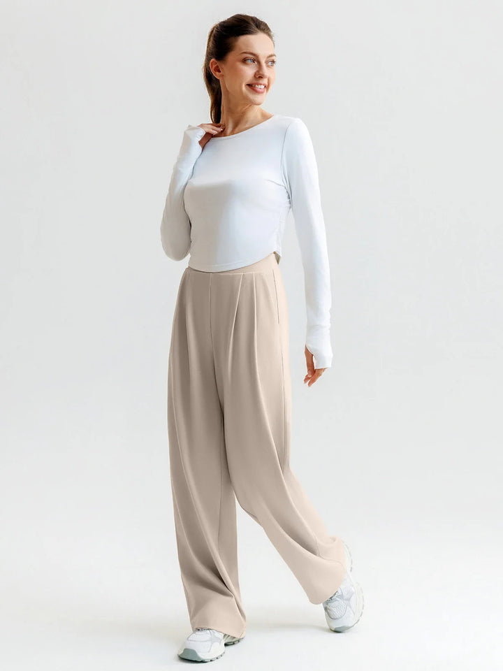 A model wearing a BRXL® High Waisted Straight Leg Commuter Pants With Pockets