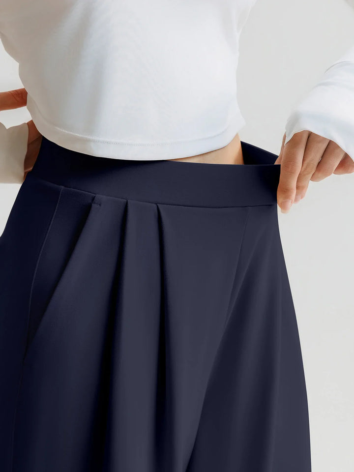 A model wearing a BRXL® High Waisted Straight Leg Commuter Pants With Pockets