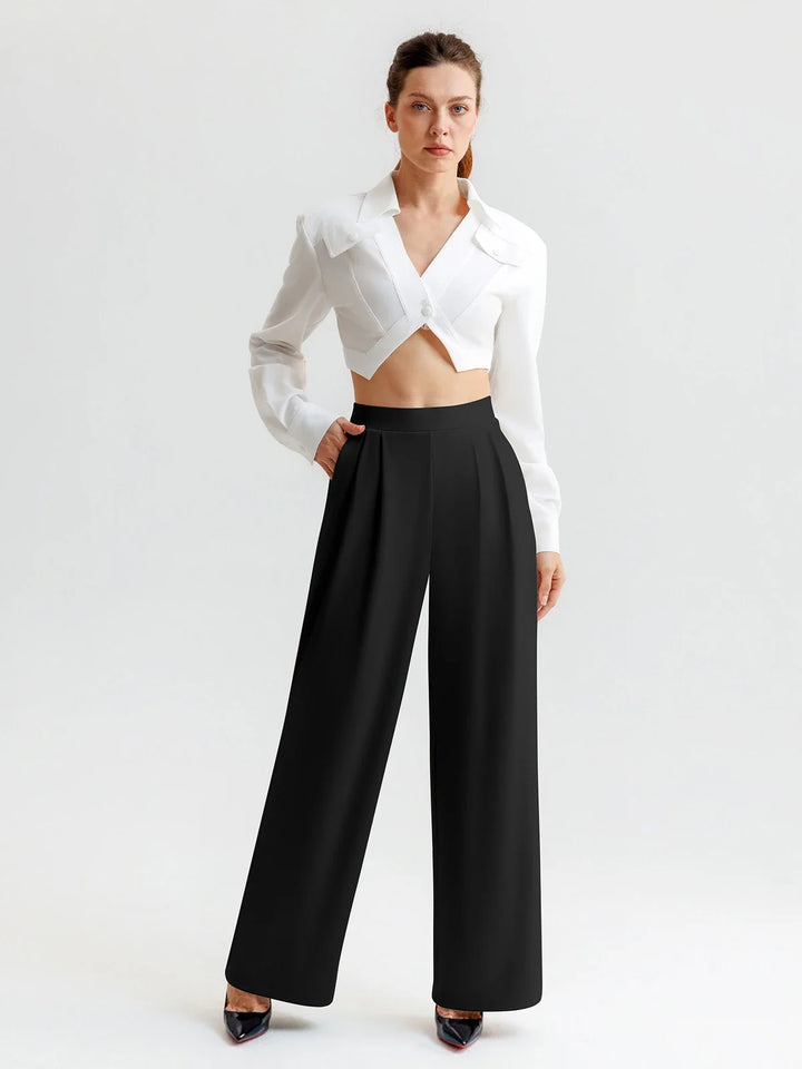 A model wearing a BRXL® High Waisted Straight Leg Commuter Pants With Pockets