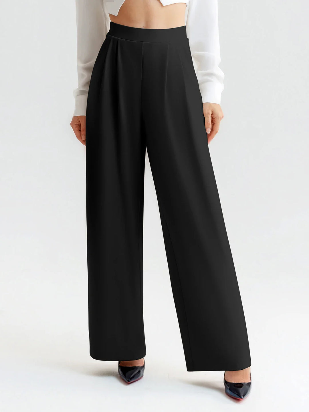 A model wearing a BRXL® High Waisted Straight Leg Commuter Pants With Pockets Petite / Black / XS