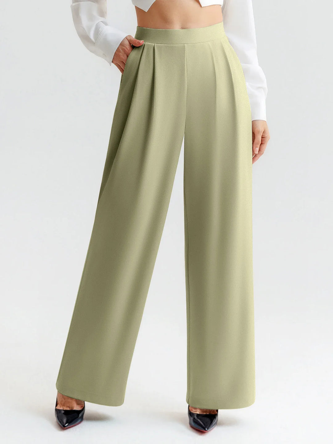 A model wearing a BRXL® High Waisted Straight Leg Commuter Pants With Pockets Petite / Mustard Green / XS
