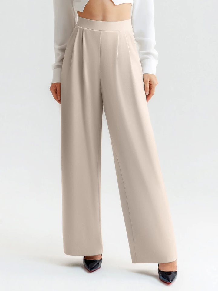 A model wearing a BRXL® High Waisted Straight Leg Commuter Pants With Pockets Petite / Stone Grey / XS