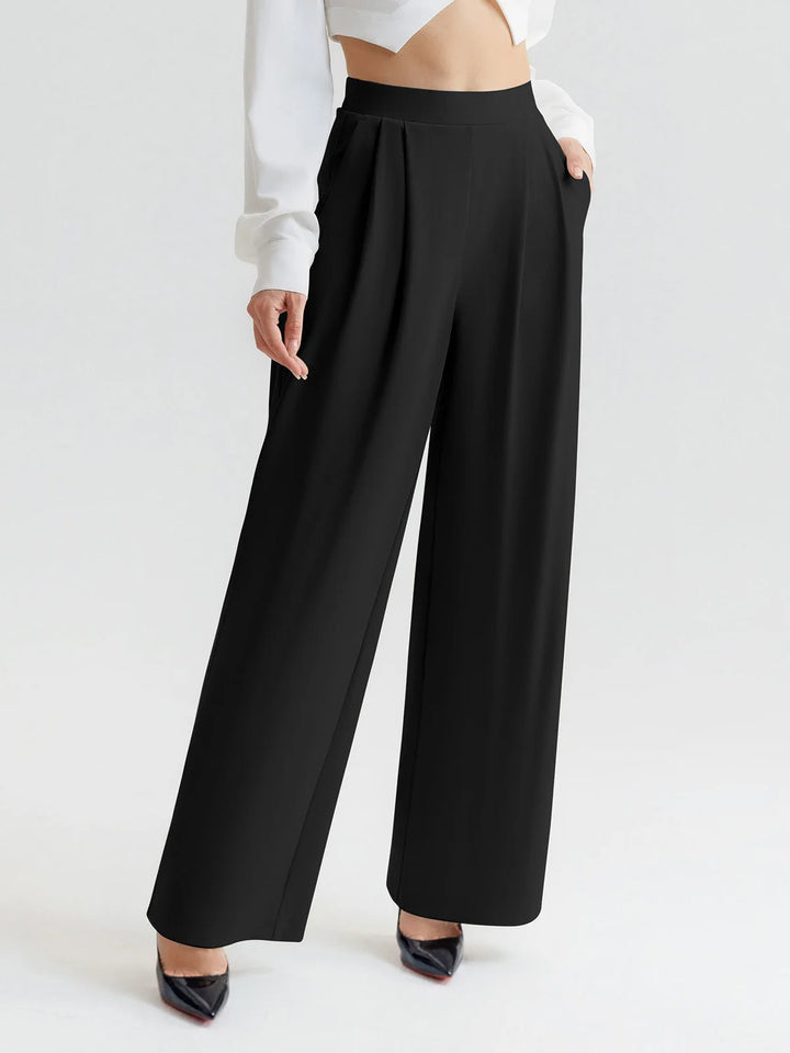 A model wearing a BRXL® High Waisted Straight Leg Commuter Pants With Pockets Regular / Black / XS