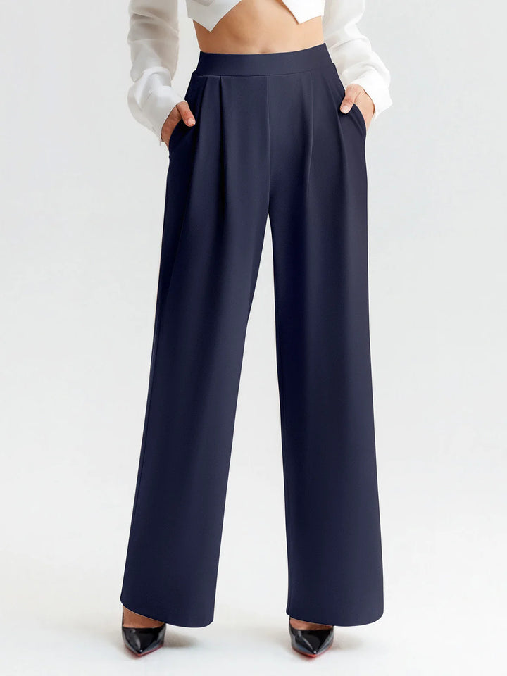 A model wearing a BRXL® High Waisted Straight Leg Commuter Pants With Pockets Regular / Navy Blue / XS