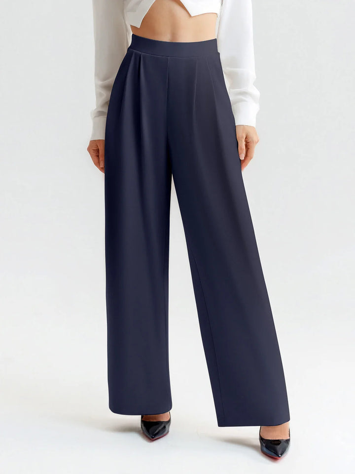 A model wearing a BRXL® High Waisted Straight Leg Commuter Pants With Pockets Tall / Navy Blue / XS