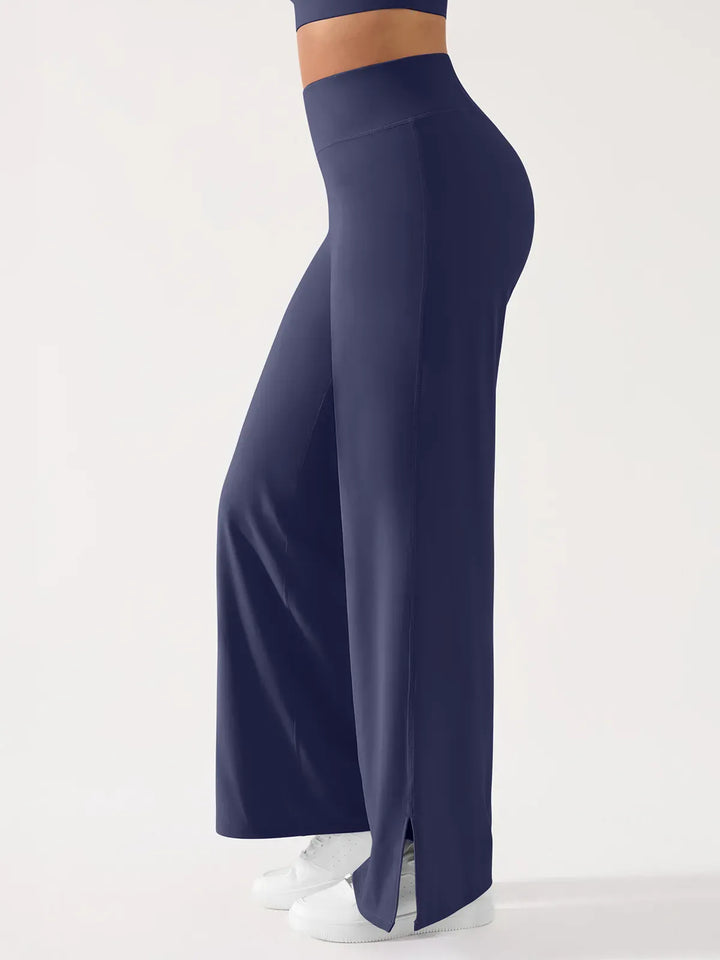 A model wearing a BRXL® High Waisted Wide Leg Hidden Pockets Yoga Pants in