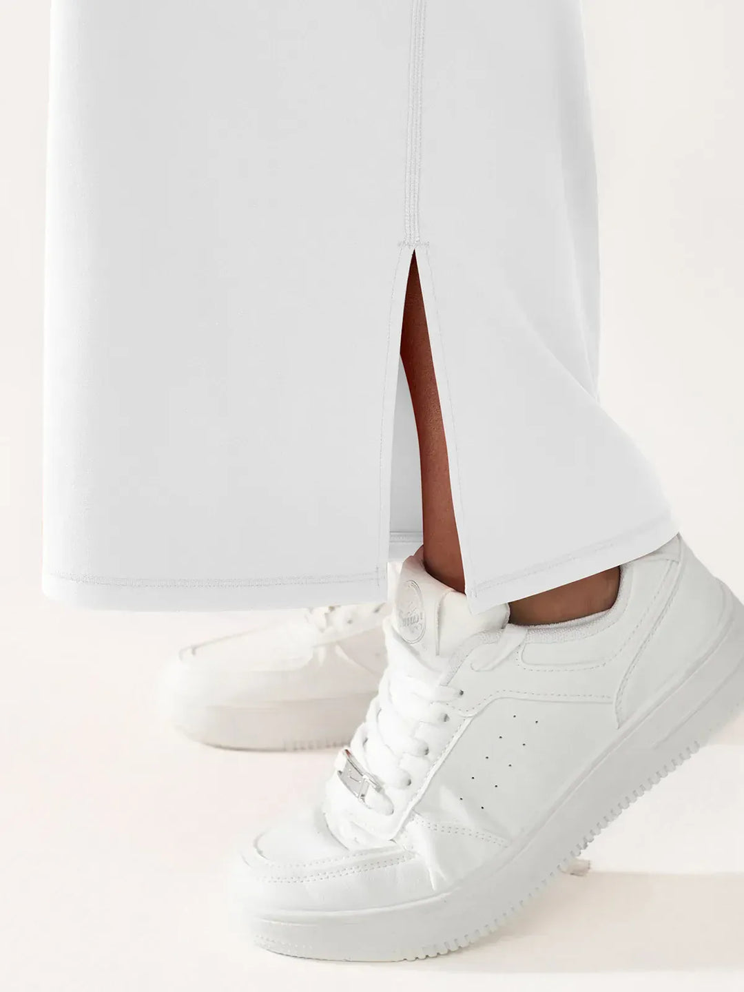 A model wearing a BRXL® High Waisted Wide Leg Hidden Pockets Yoga Pants in