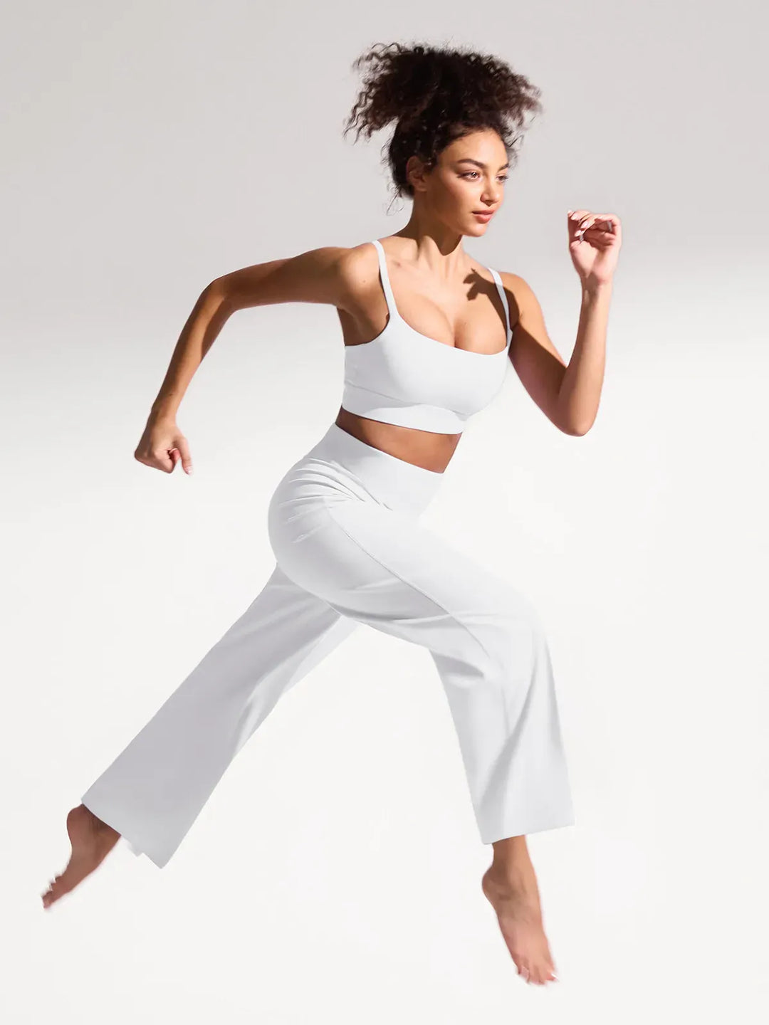 A model wearing a BRXL® High Waisted Wide Leg Hidden Pockets Yoga Pants