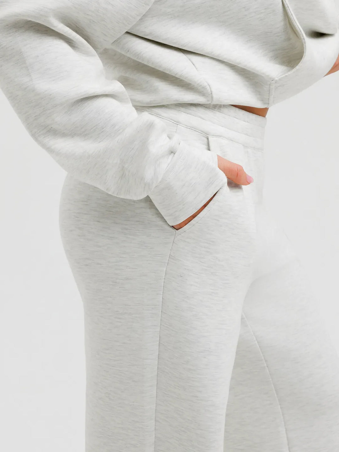 A model wearing a BRXL® Lightweight Mid-Rise Wide Leg Baggy Sweatpants