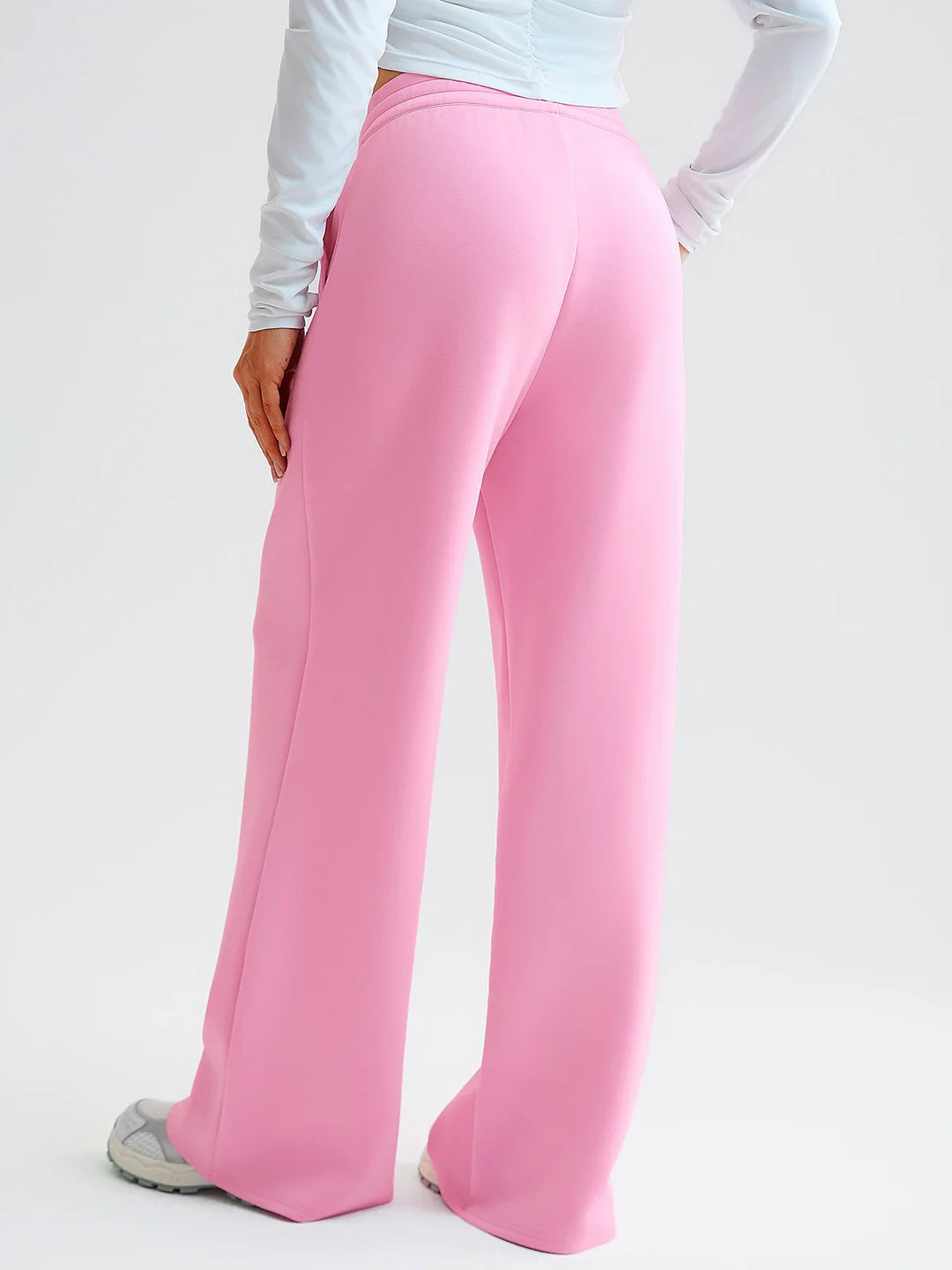 A model wearing a BRXL® Lightweight Mid-Rise Wide Leg Baggy Sweatpants
