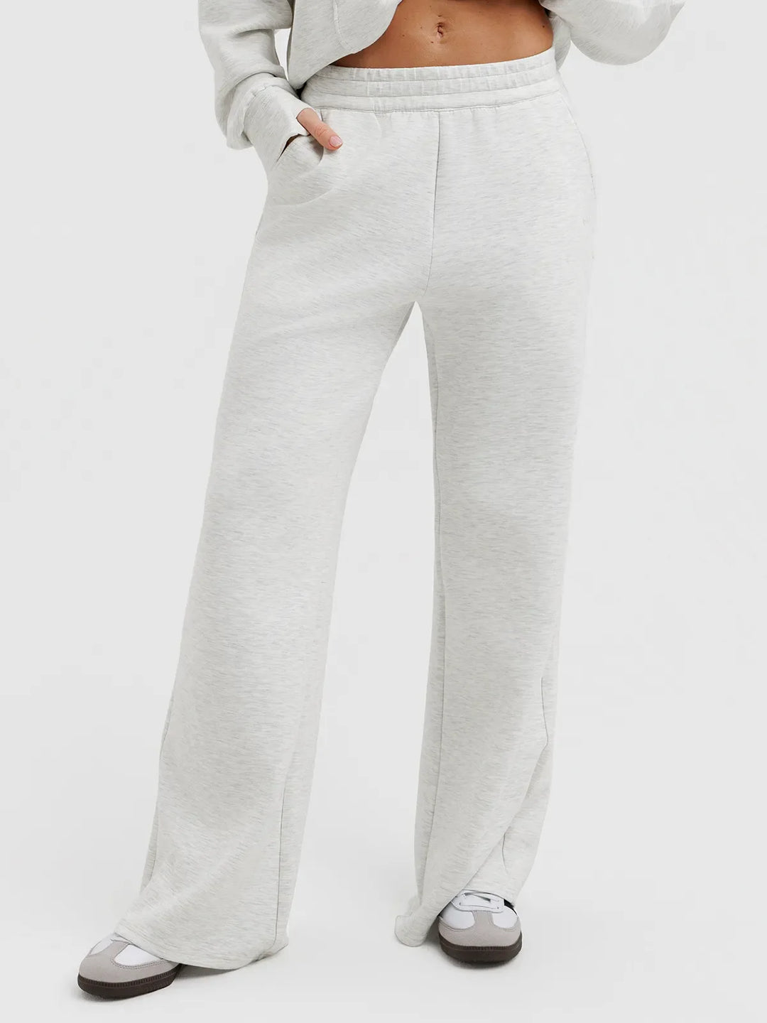 A model wearing a BRXL® Lightweight Mid-Rise Wide Leg Baggy Sweatpants Charcoal Grey / XS