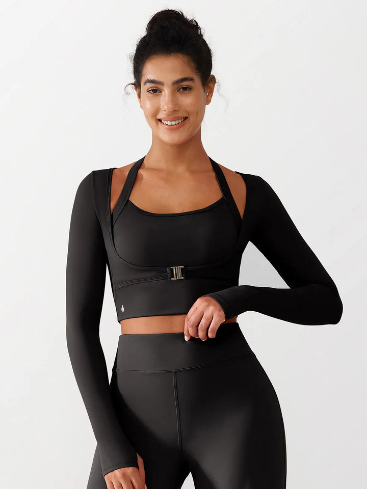 A model wearing a BRXL® Long Sleeve Halter Shrug Top with Buckle and Thumbhole in