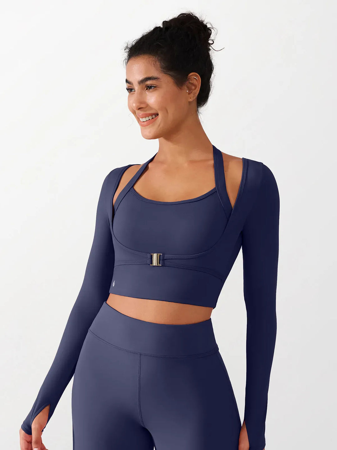 A model wearing a BRXL® Long Sleeve Halter Shrug Top with Buckle and Thumbhole in