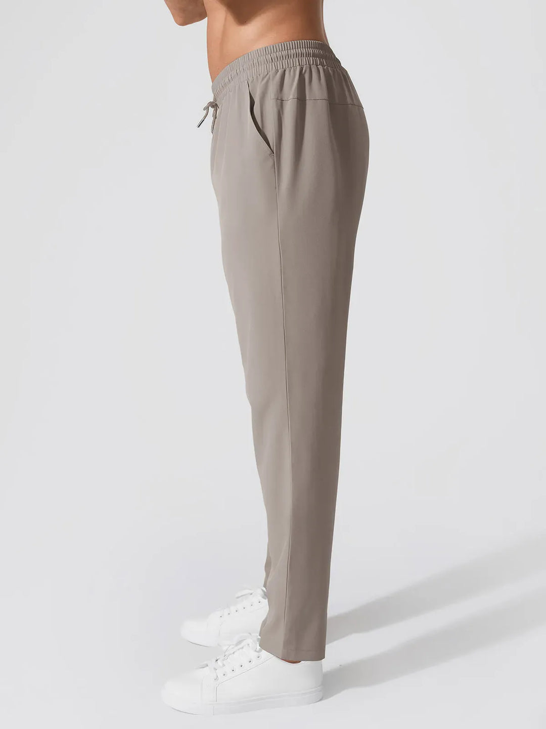 A model wearing a BRXL® Men’s  Adjustable Waist Tapered Activewear Joggers in