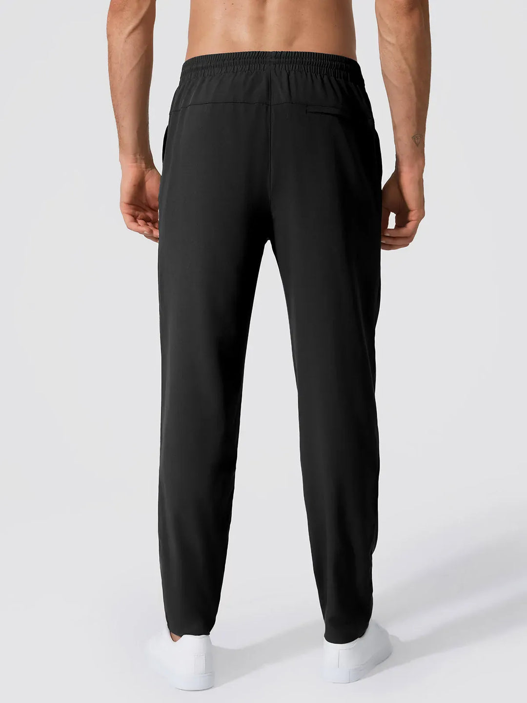 A model wearing a BRXL® Men’s  Adjustable Waist Tapered Activewear Joggers in