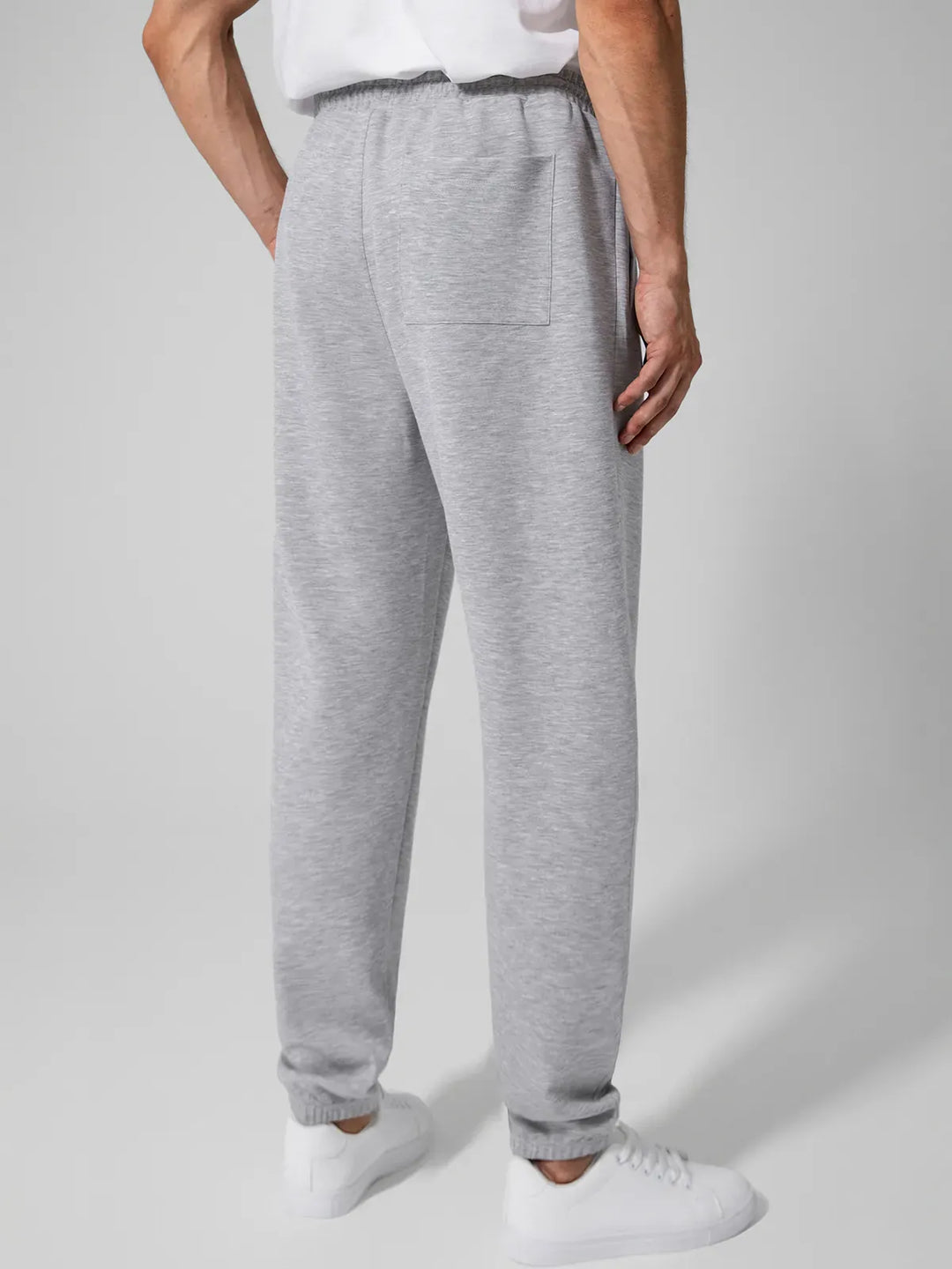 A model wearing a BRXL® Men's Four Pockets Drawstring Waist Activewear Sweatpants in