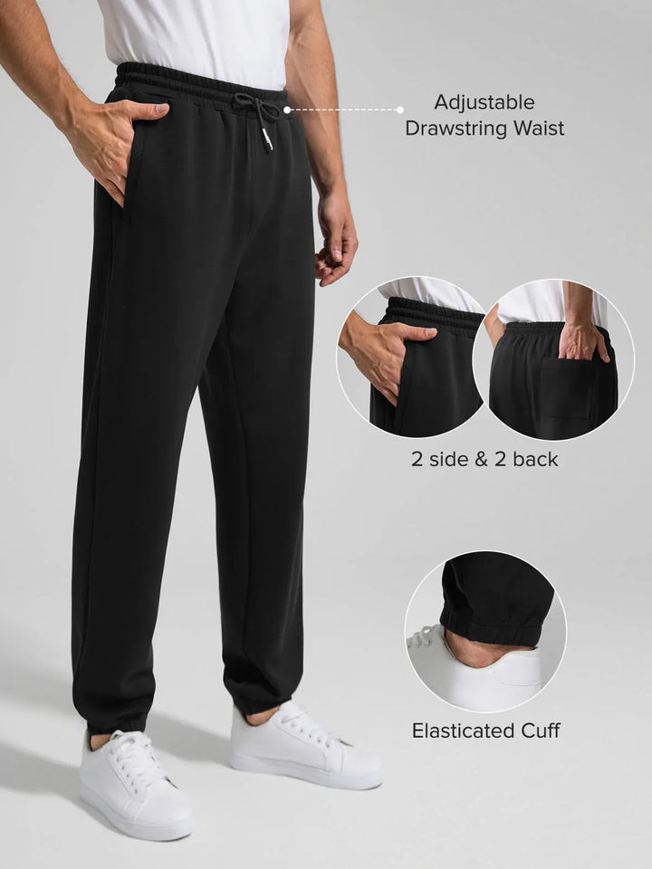 A model wearing a BRXL® Men's Four Pockets Drawstring Waist Activewear Sweatpants in
