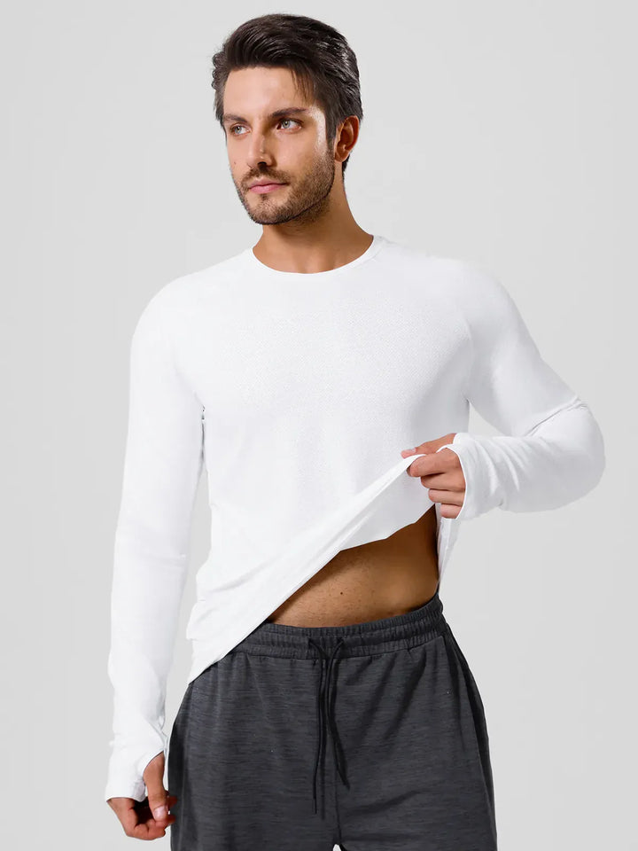 A model wearing a BRXL® Men’s Long Sleeve Thumbhole Activewear Shirt in