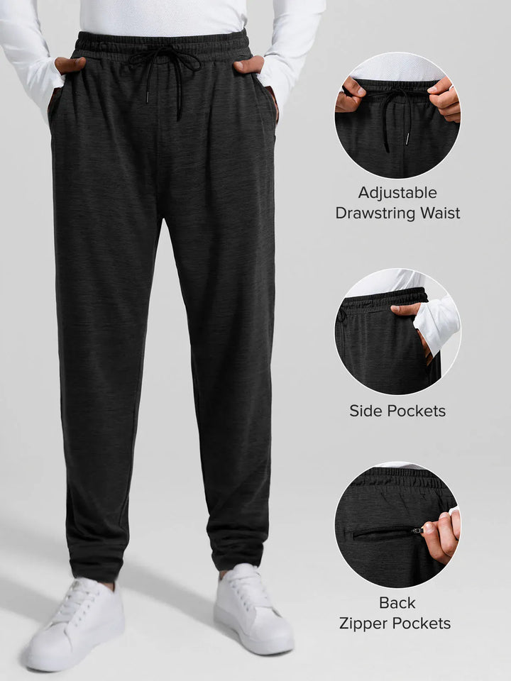 A model wearing a BRXL® Men’s Smooth Four Pockets Tapered Joggers in