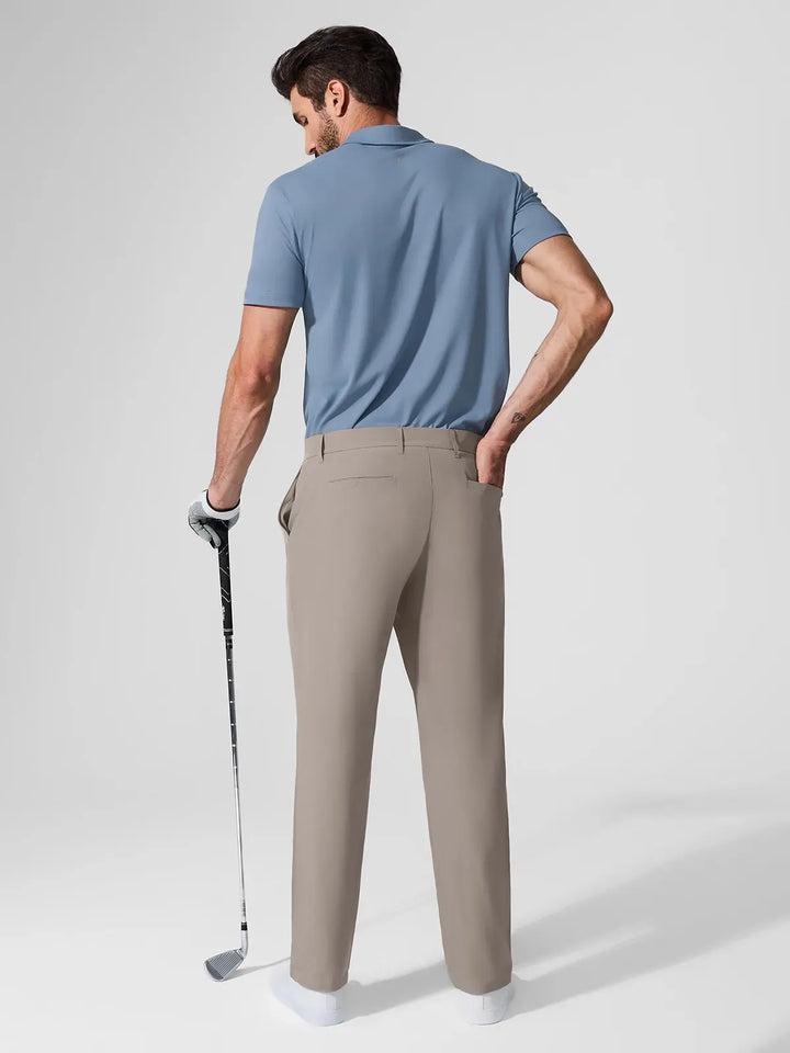 A model wearing a BRXL® Men’s Straight Leg Golf Pants in