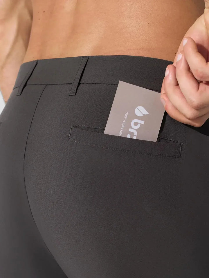 A model wearing a BRXL® Men’s Straight Leg Golf Pants in