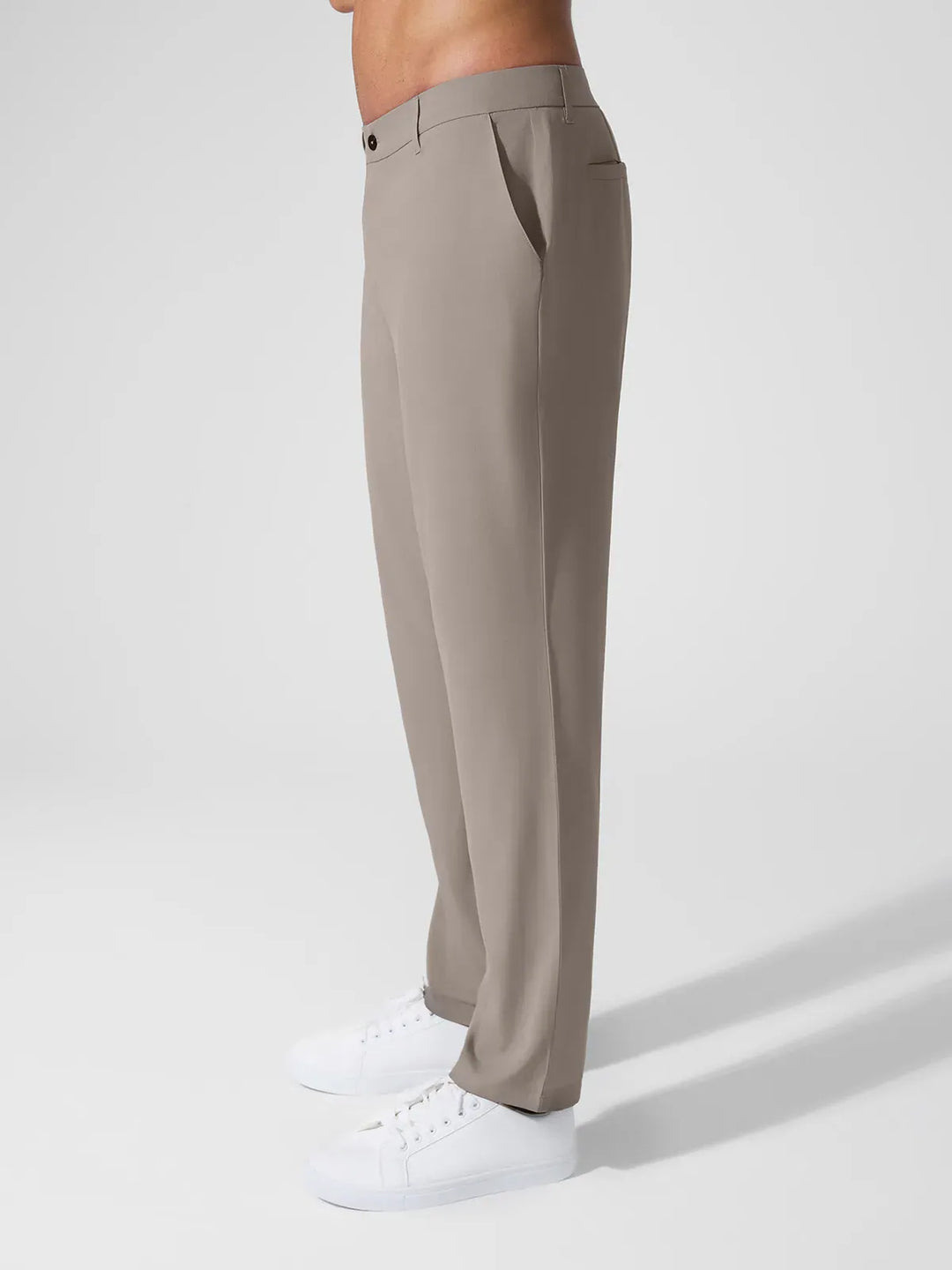 A model wearing a BRXL® Men’s Straight Leg Golf Pants in