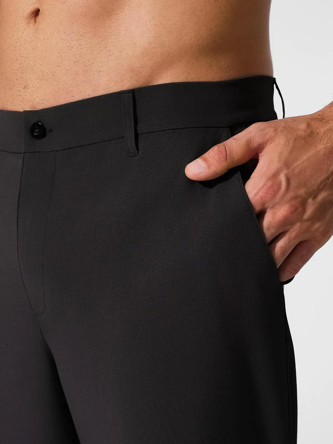 A model wearing a BRXL® Men’s Straight Leg Golf Pants in