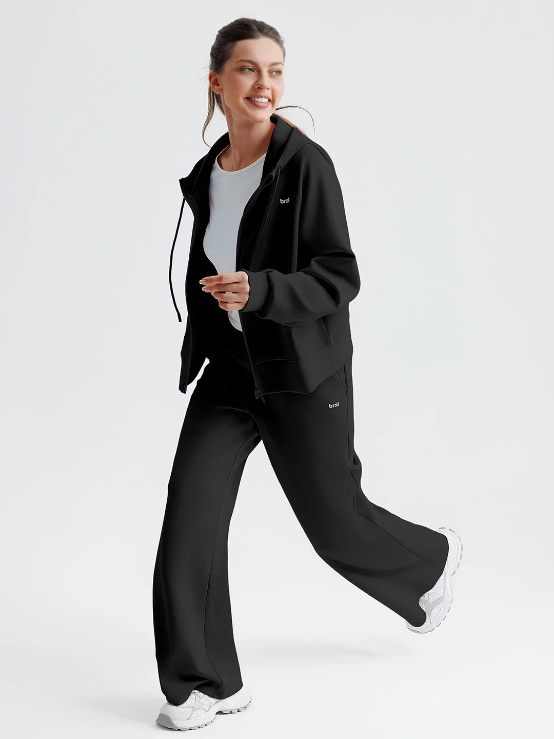 A model wearing a BRXL® Oversized Cropped Zip-Up Comfort Hoodie