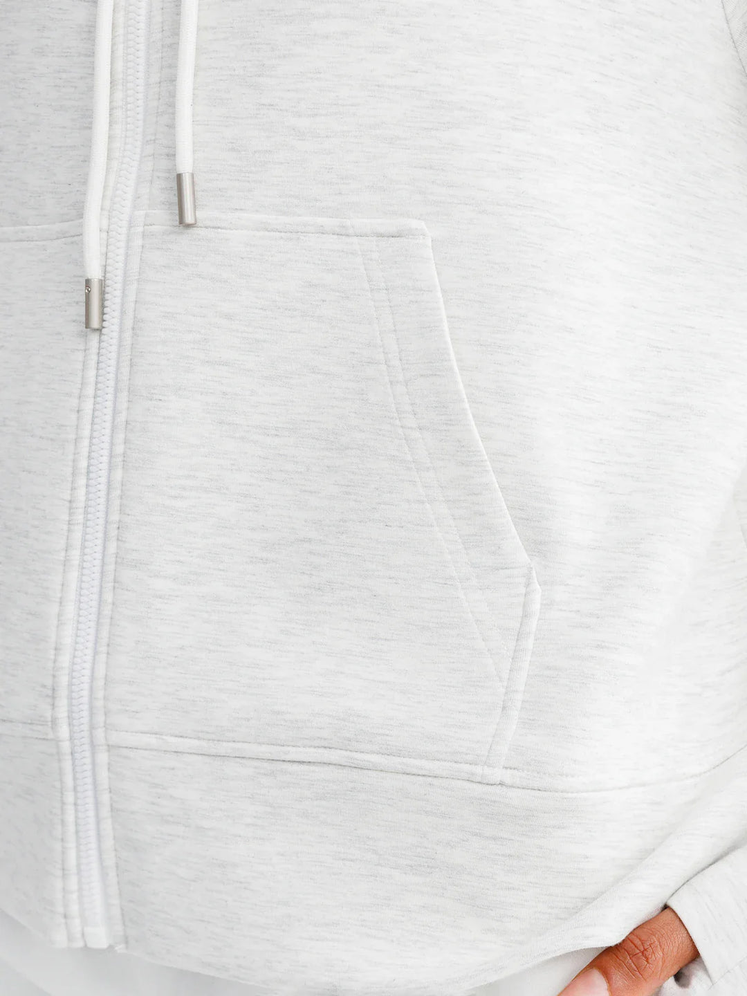 A model wearing a BRXL® Oversized Cropped Zip-Up Comfort Hoodie