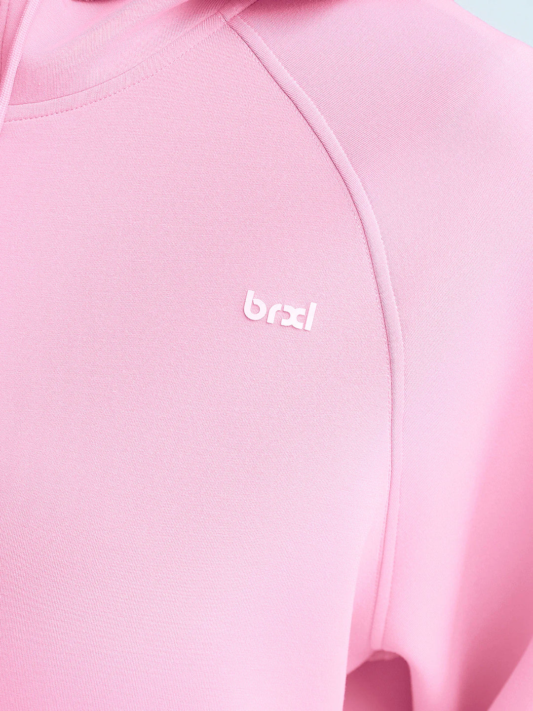 A model wearing a BRXL® Oversized Cropped Zip-Up Comfort Hoodie