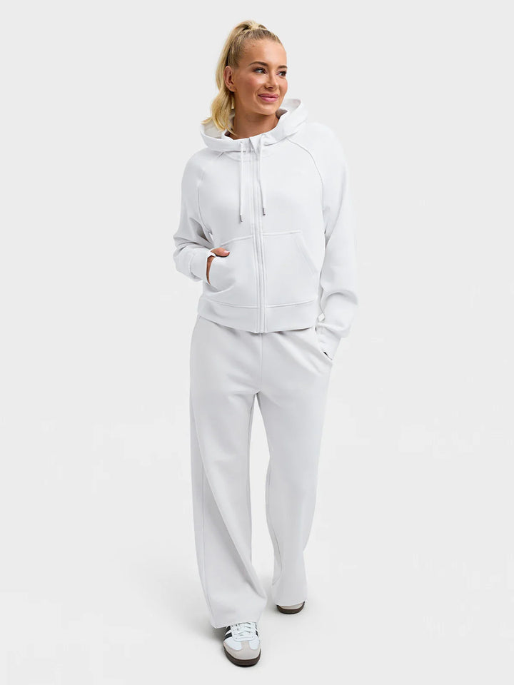 A model wearing a BRXL® Oversized Cropped Zip-Up Comfort Hoodie