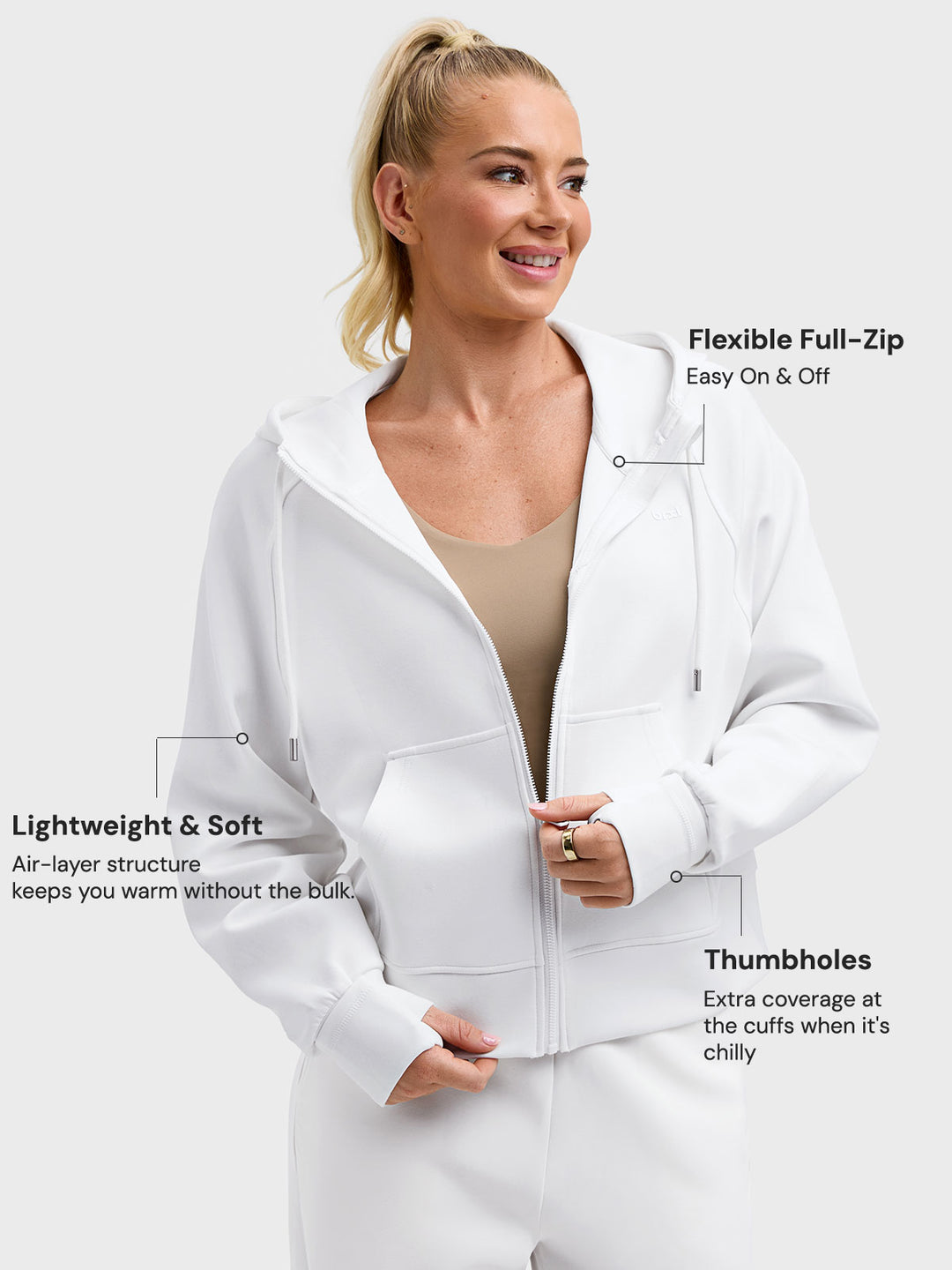 A model wearing a BRXL® Oversized Cropped Zip-Up Comfort Hoodie