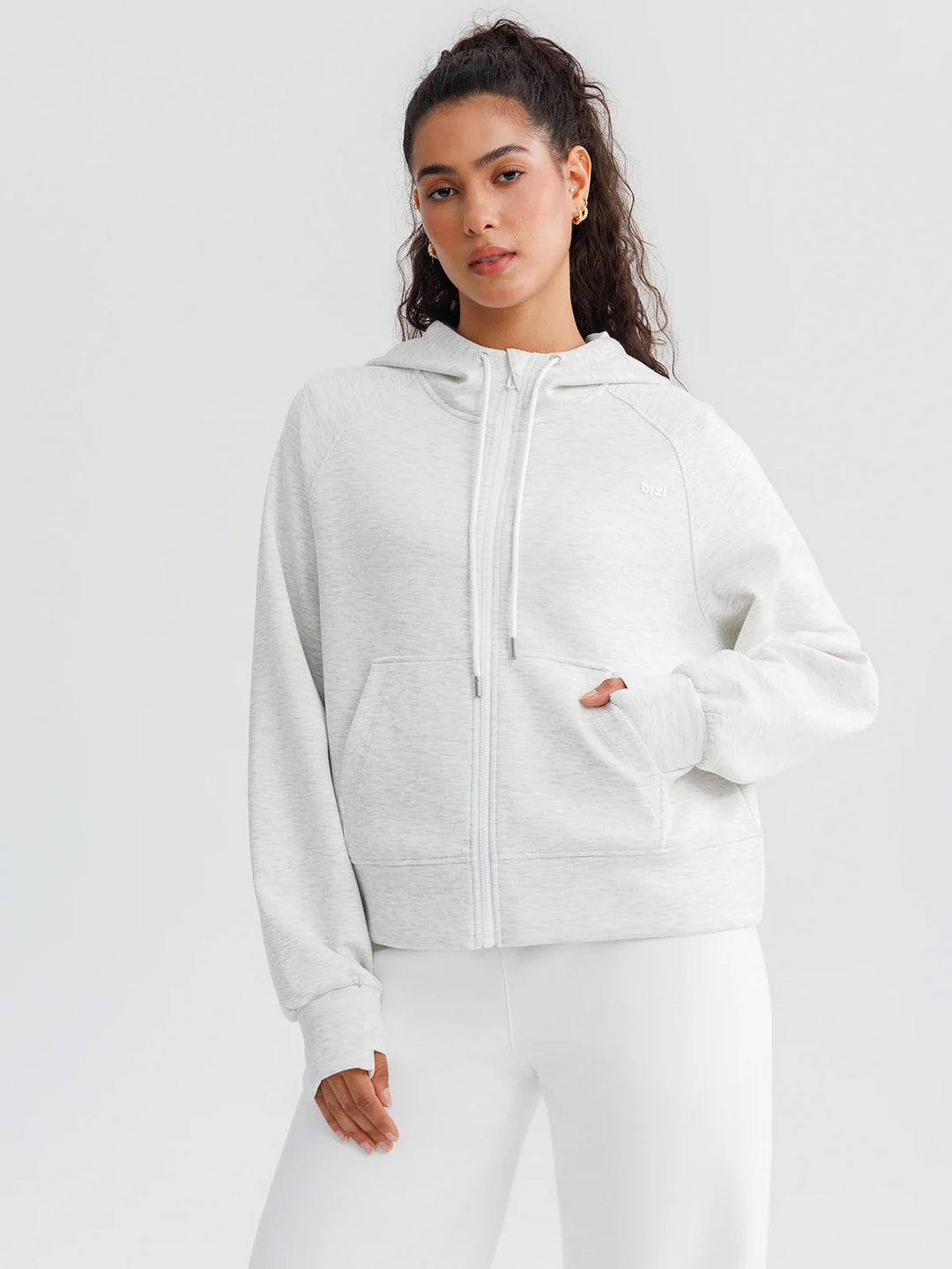 A model wearing a BRXL® Oversized Cropped Zip-Up Comfort Hoodie Charcoal Grey / XS