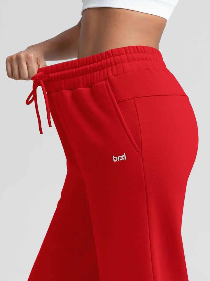 A model wearing a BRXL® Oversized Fleece Travel Jogger Sweatpants with Pockets