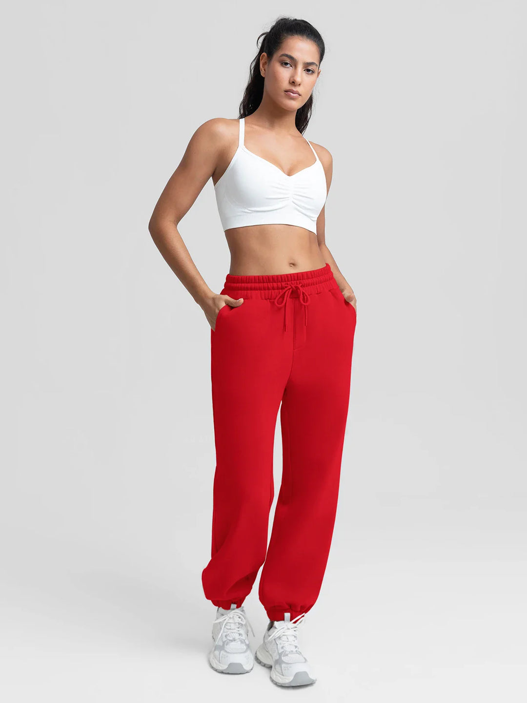 A model wearing a BRXL® Oversized Fleece Travel Jogger Sweatpants with Pockets