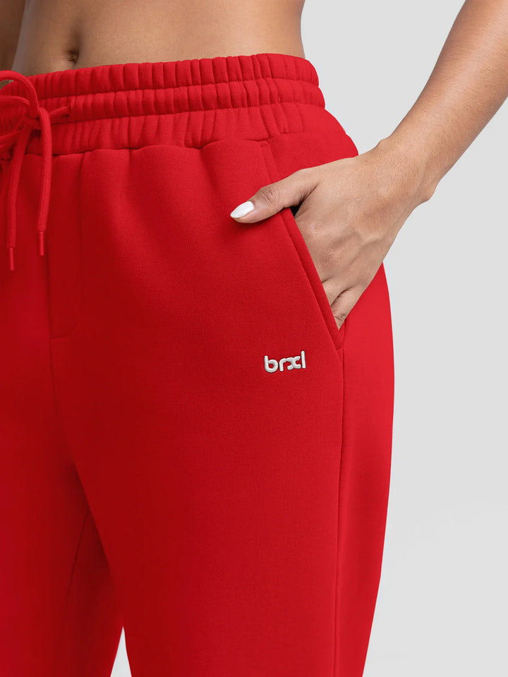 A model wearing a BRXL® Oversized Fleece Travel Jogger Sweatpants with Pockets