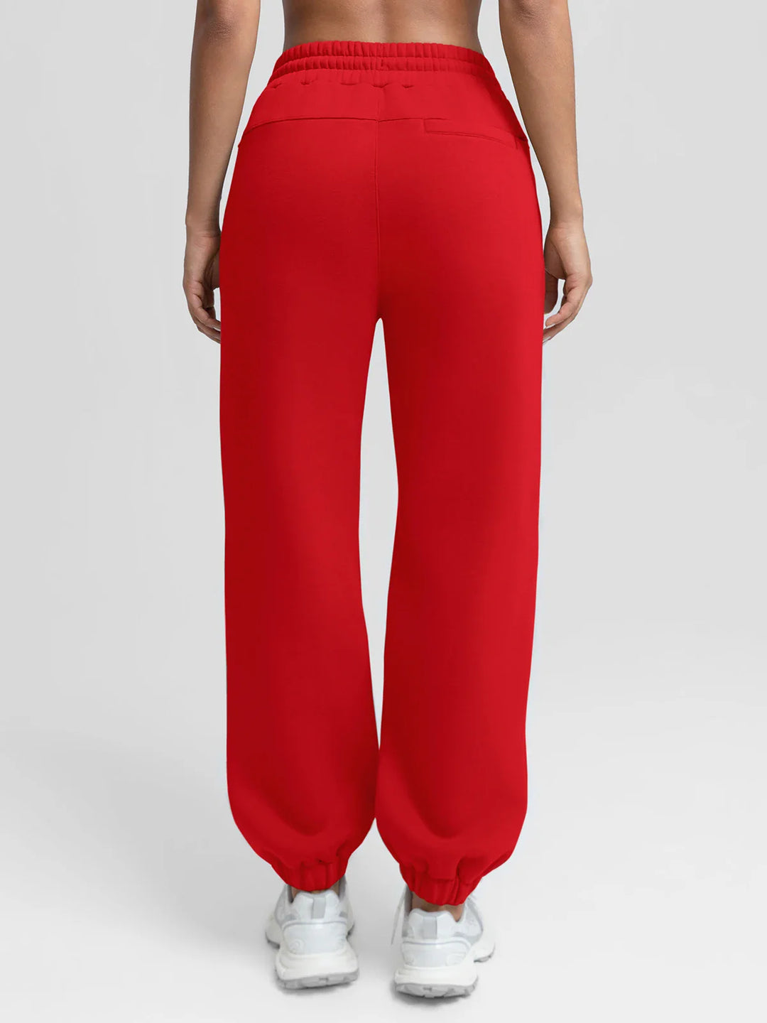 A model wearing a BRXL® Oversized Fleece Travel Jogger Sweatpants with Pockets