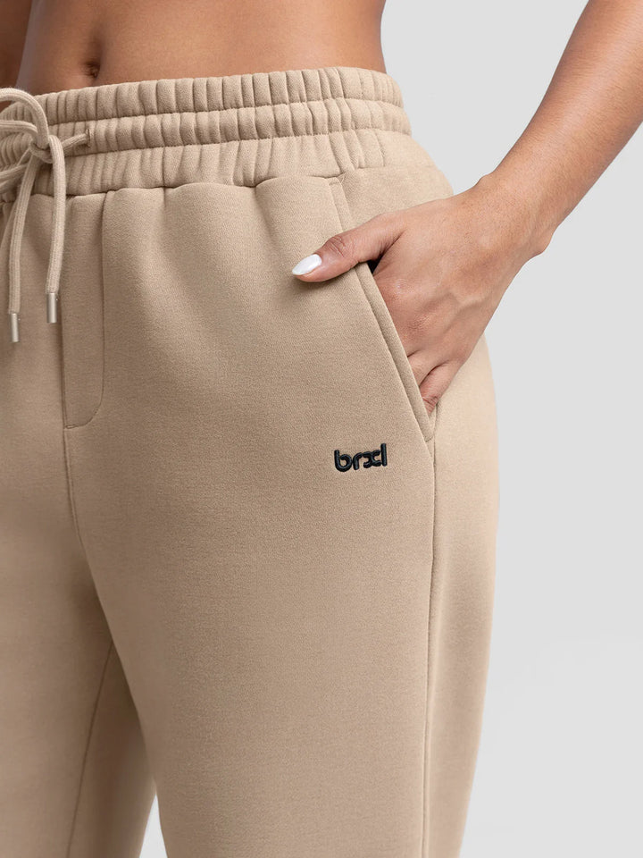 A model wearing a BRXL® Oversized Fleece Travel Jogger Sweatpants with Pockets
