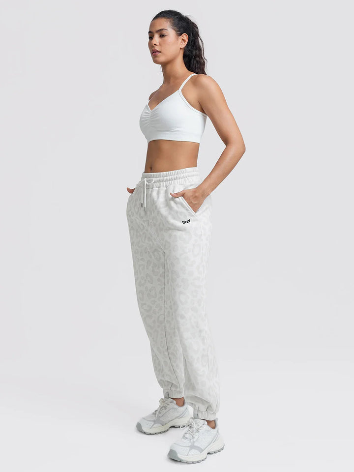 A model wearing a BRXL® Oversized Fleece Travel Jogger Sweatpants with Pockets