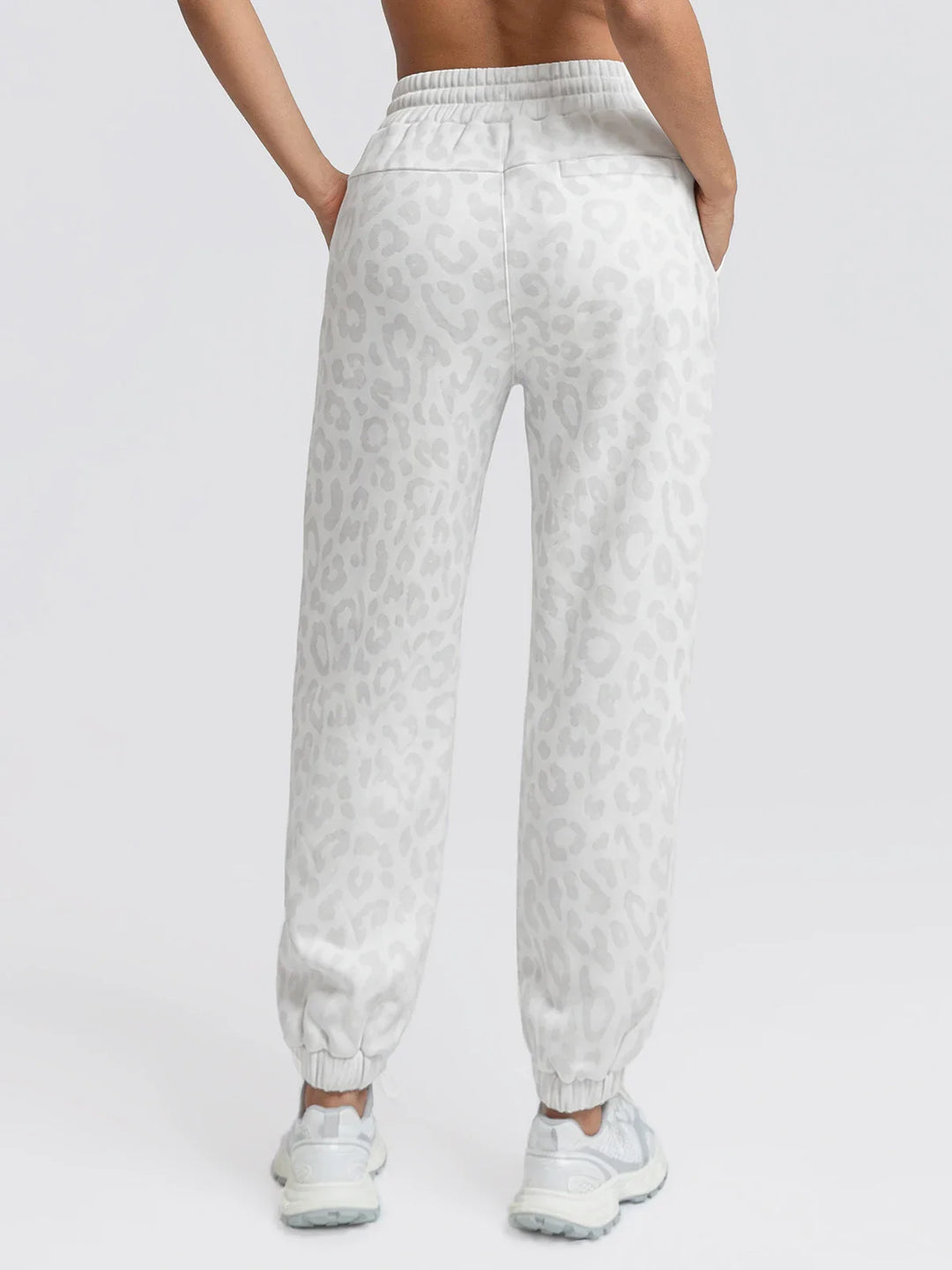 A model wearing a BRXL® Oversized Fleece Travel Jogger Sweatpants with Pockets
