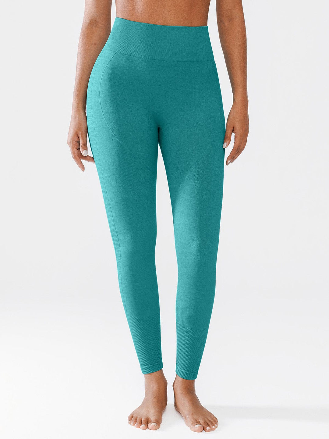 A model wearing a BRXL® Seamless Butt Scrunch Spandx Leggings With Tummy Control in